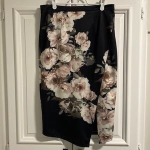 Floral pencil skirt with front slit.
